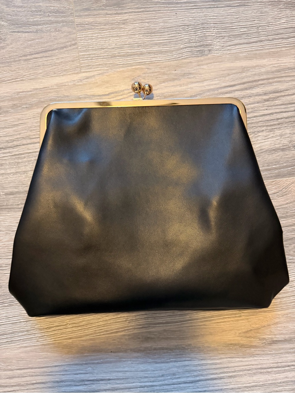 Elegant Black Frame Clutch with Gold Hardware and strap